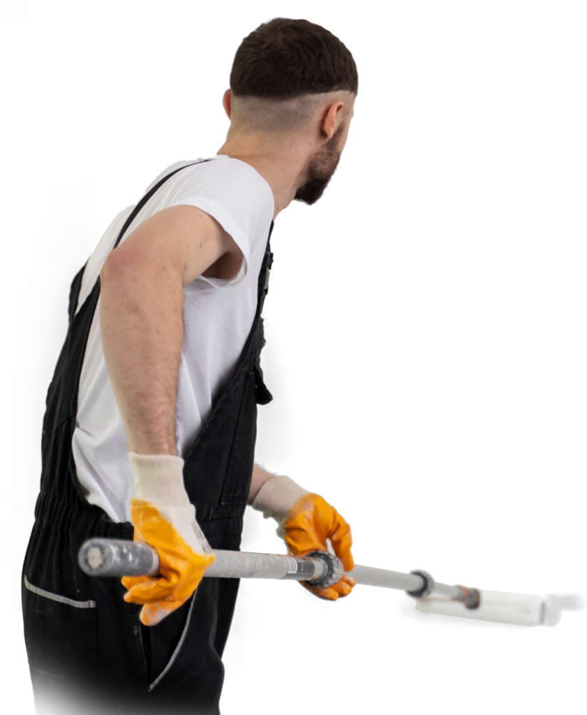 young-man-painting-wall-medium-shot